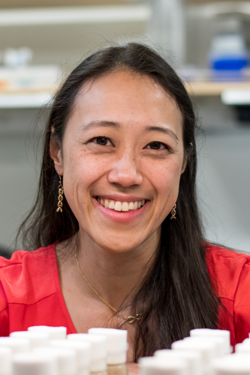Close up of Maiko Kitaoka in the lab, smiling at the camera