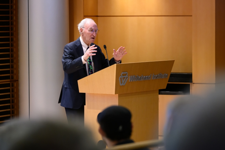 Gerry Fink speaking at a podium